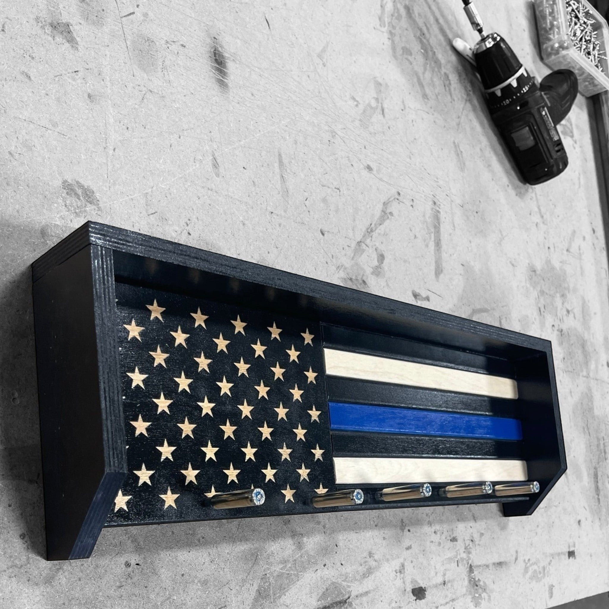 Breacher Rustics Thin Blue Line flag key rack with black hooks and blue stripe detail. Made of wood. blue line flag wall key holder organizer rack wooden rustic entryway storage for keys patriotic home decor