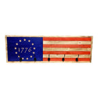 Breacher Rustics 1776 Betsy Ross American flag coat rack with 5 black hooks. Wooden, red, white, and blue design. 1776 betsy ross american flag usa coat rack wooden wall mounted hook rack patriotic entryway organizer made in usa