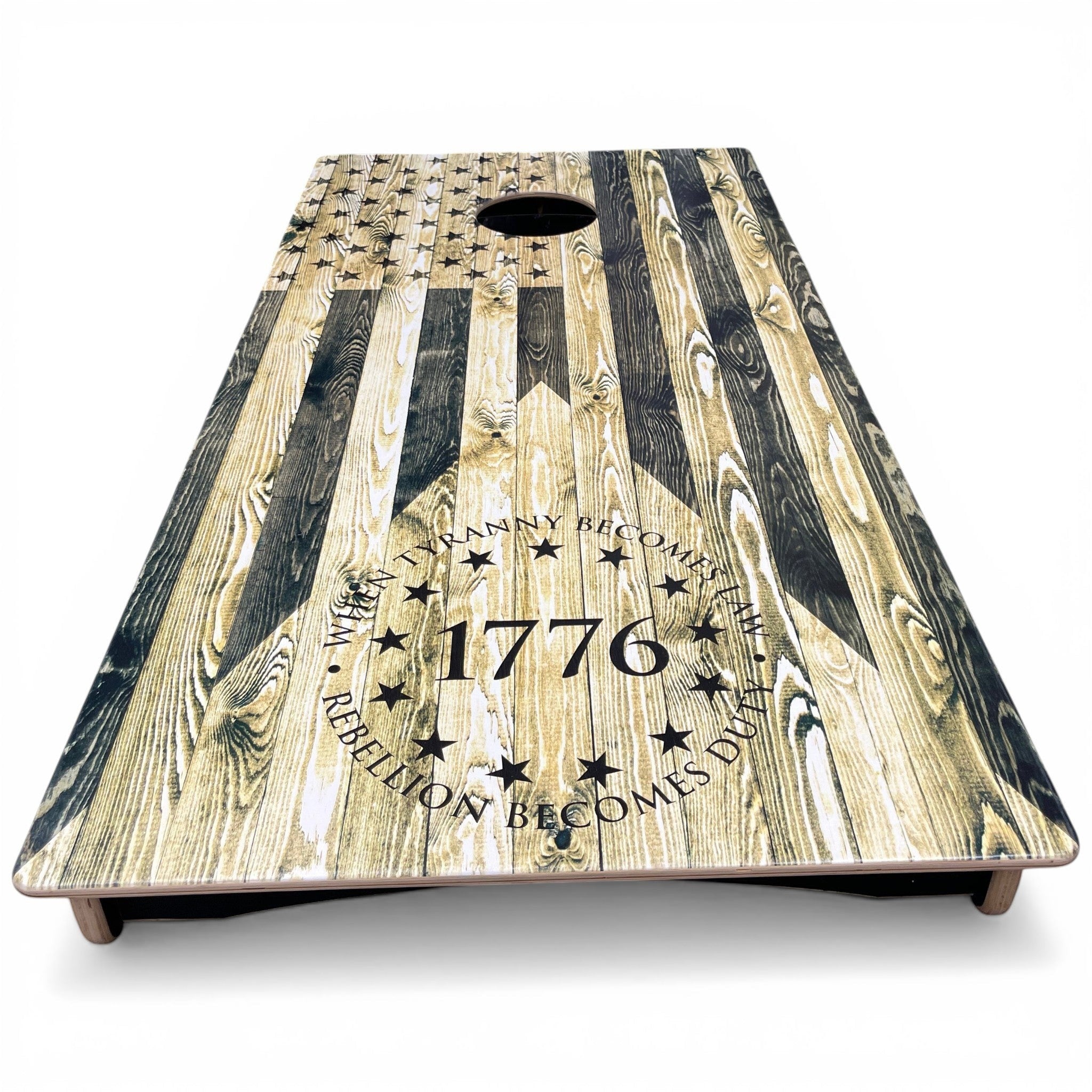 Breacher Rustics 1776 Tyranny/Rebellion USA flag cornhole set with wood grain finish. Features stars and patriotic quote.