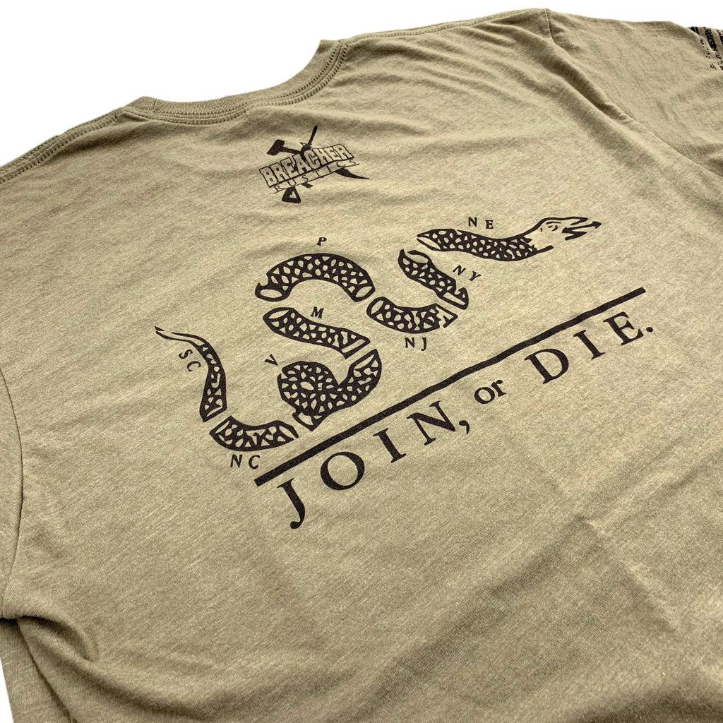 Breacher Rustics tan t-shirt with a black graphic of a segmented snake forming the letters "US" and the phrase "JOIN, or DIE."