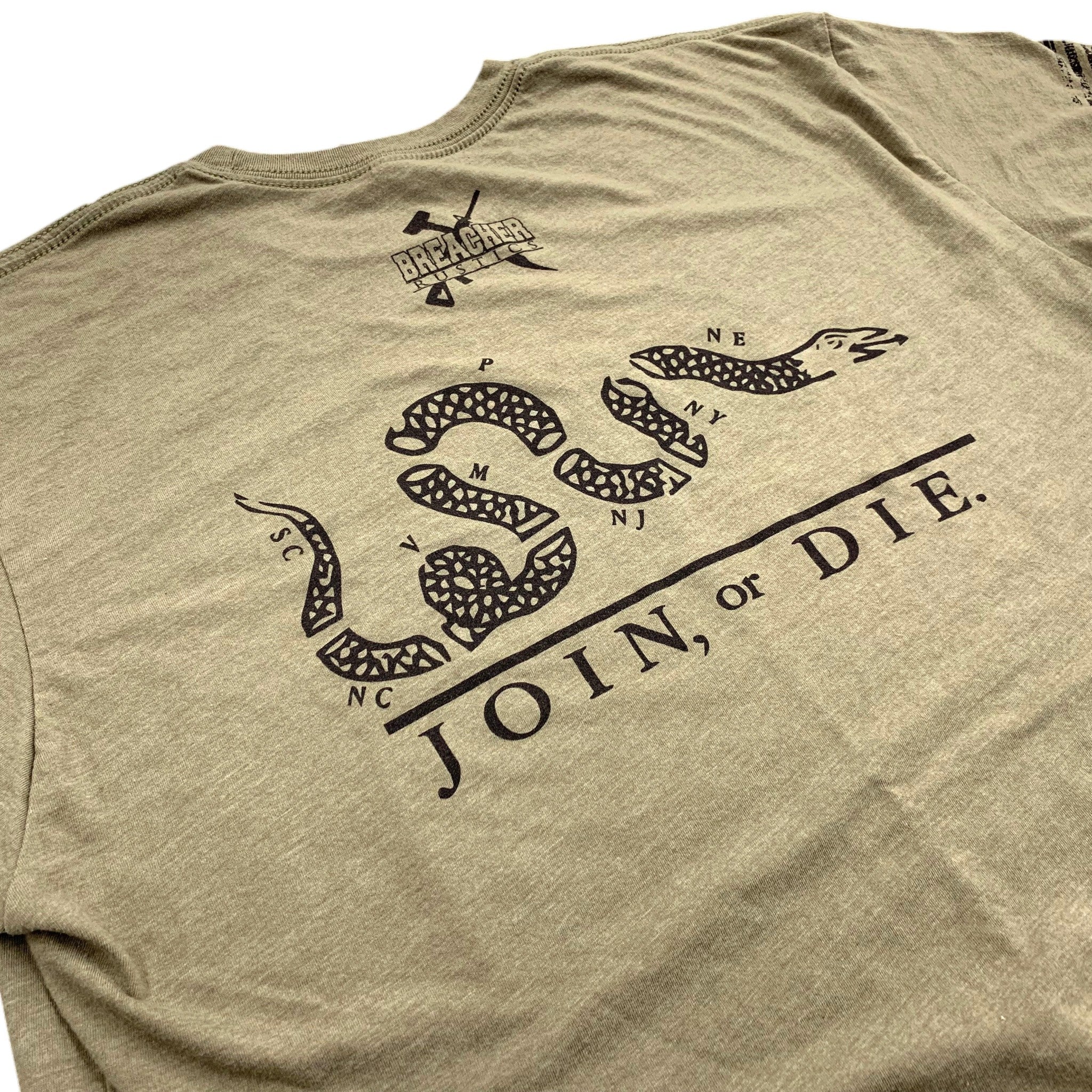 Breacher Rustics tan t-shirt with a black graphic of a segmented snake forming the letters "US" and the phrase "JOIN, or DIE."