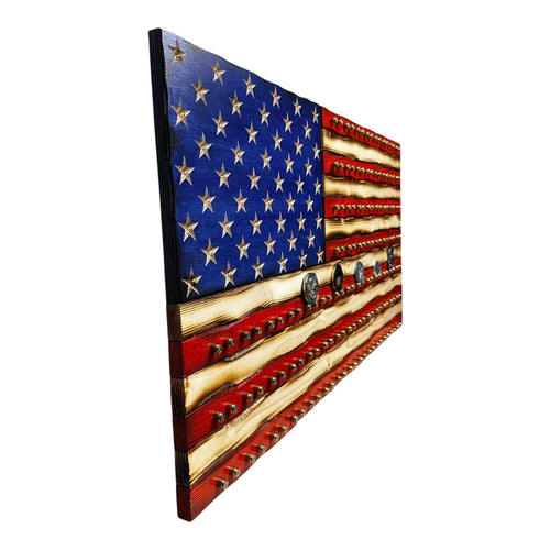 Breacher Rustics American flag display with 9mm casings for challenge coins. Features carved stars and stripes with a rustic, battle-worn finish.