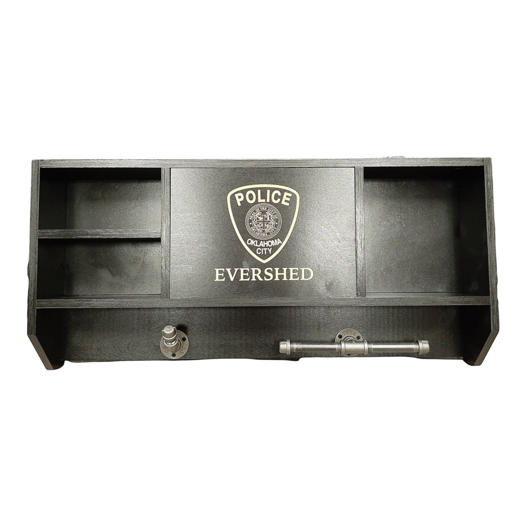 Breacher Rustics black wooden concealment shelf with police badge and custom name. Features open shelves and pipe-style hooks. handmade leo concealment gear rack black wood cabinet usa made hidden storage shelf for firearms and gear