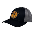 Breacher Rustics black trucker hat with a bamboo leather patch featuring a bull skull and "Try That in a Small Town" text. Features mesh back and snapback closure. Jason Aldean