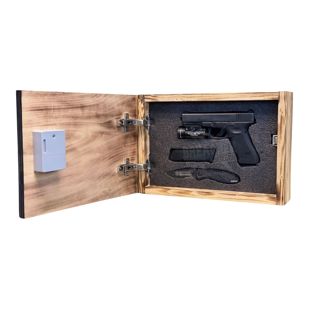 Breacher Rustics wooden concealment box with RFID lock, open to reveal a handgun, magazine, and knife secured in Kaizen foam. airborne military concealment box RFID lock wooden hidden storage engraved unit logo patriotic gun storage box usa made
