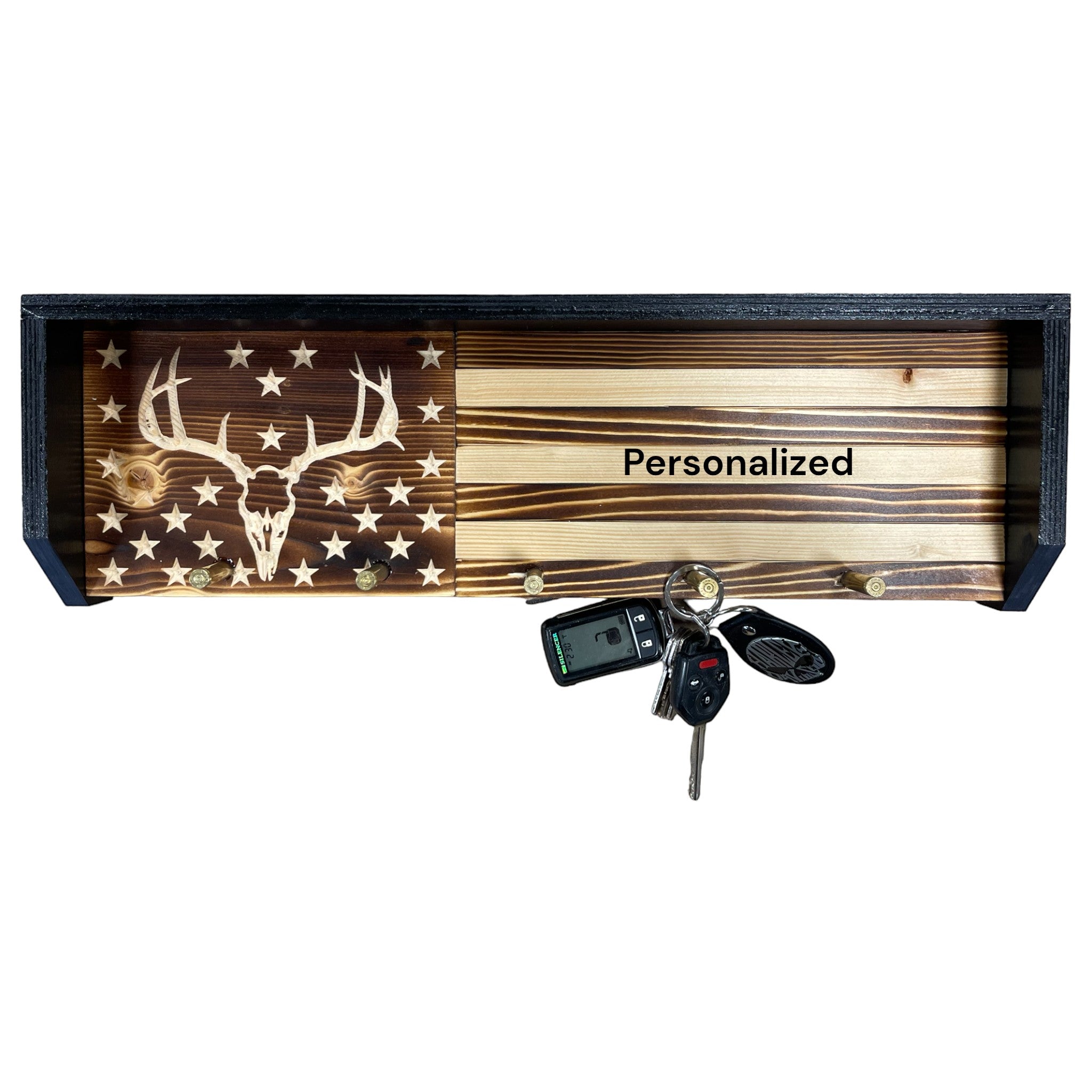 Breacher Rustics wooden key rack with American flag design, deer skull, and bullet casings. Personalized.