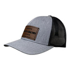 Breacher Rustics gray cotton blend trucker hat with black mesh back and brown leather patch saying "Try That in a Small Town" Jason Aldean