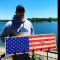 Breacher Rustics grey cotton blend pullover hoodie with American flag graphic and "Respect" text. Man holding wooden flag rack. 13 folds hoodie patriotic american flag meaning hoodie first responder military tribute apparel soft comfortable fit