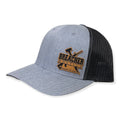 Breacher Rustics heather grey trucker hat with black mesh back and leather patch logo. Structured, six-panel, low-profile with adjustable snapback.