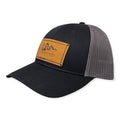Breacher Rustics black cotton trucker hat with grey mesh back and bamboo leather patch featuring the Join, or Die snake.