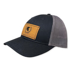 Breacher Rustics Molon Labe patch hat. Black cotton front with grey mesh back. Features a bamboo leather patch with Spartan helmet.