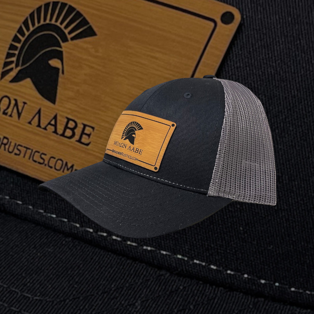 Breacher Rustics Molon Labe patch hat, black cotton front with grey mesh back, adjustable snapback, bamboo leather patch.