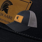 Breacher Rustics Molon Labe patch hat, black cotton front with grey mesh back, adjustable snapback, bamboo leather patch.
