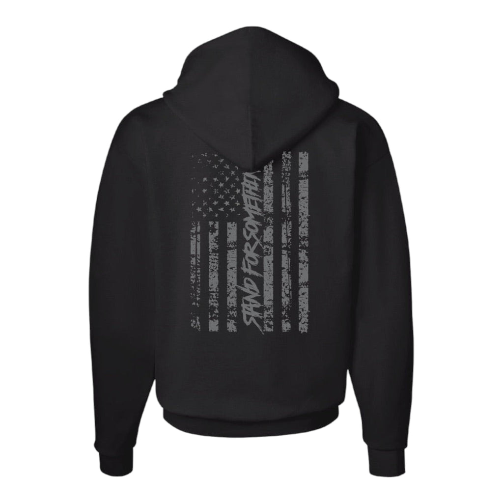 Breacher Rustics black cotton blend pullover hoodie with distressed American flag graphic and "Stand For Something" text. breacher rustics premium hoodie usa apparel soft durable athletic fit patriotic clothing made for everyday wear