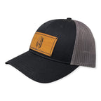 Breacher Rustics black trucker hat with grey mesh back and bamboo leather patch featuring a Spartan helmet with American flag design.
