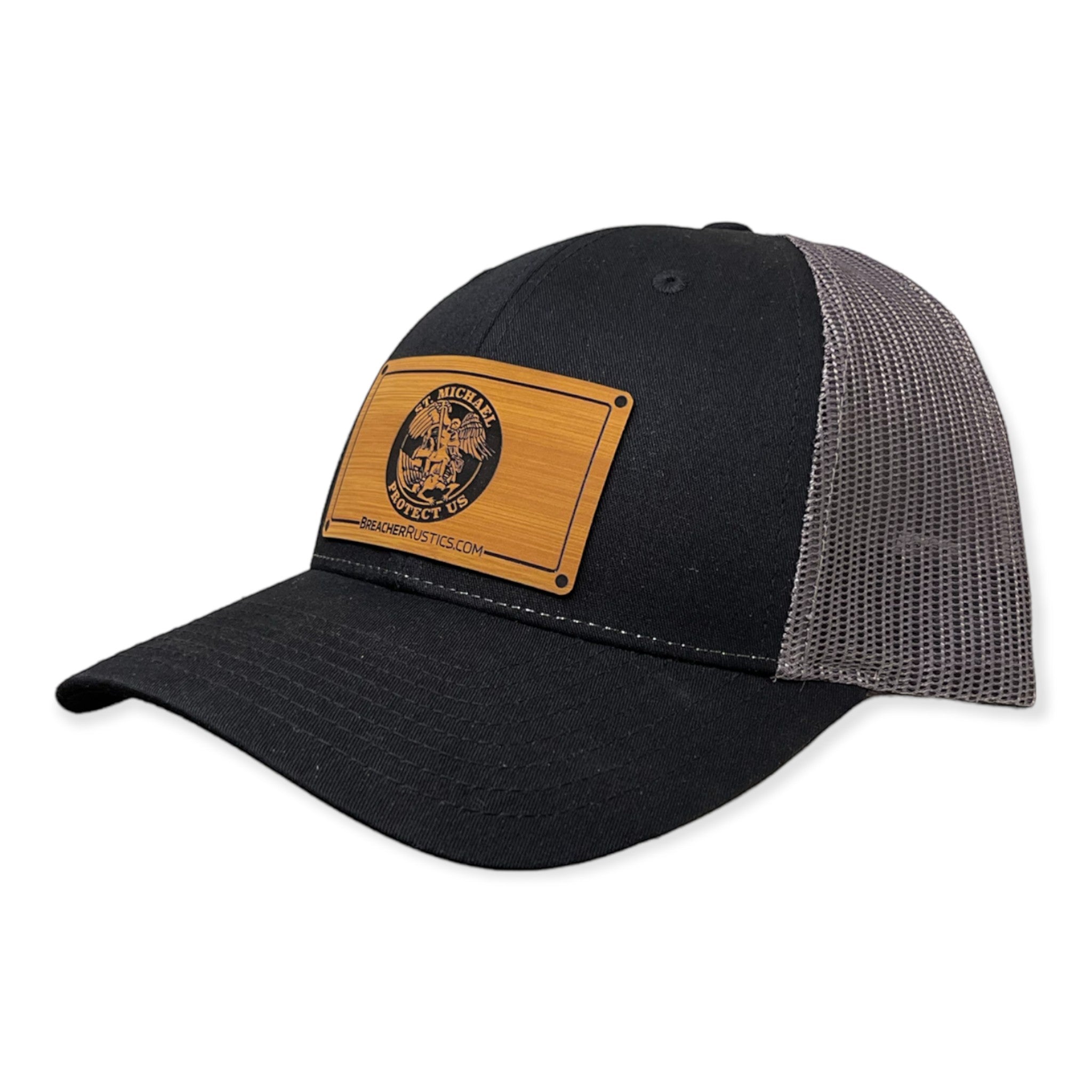 Breacher Rustics black trucker hat with St. Michael patch and grey mesh back. Adjustable snapback.