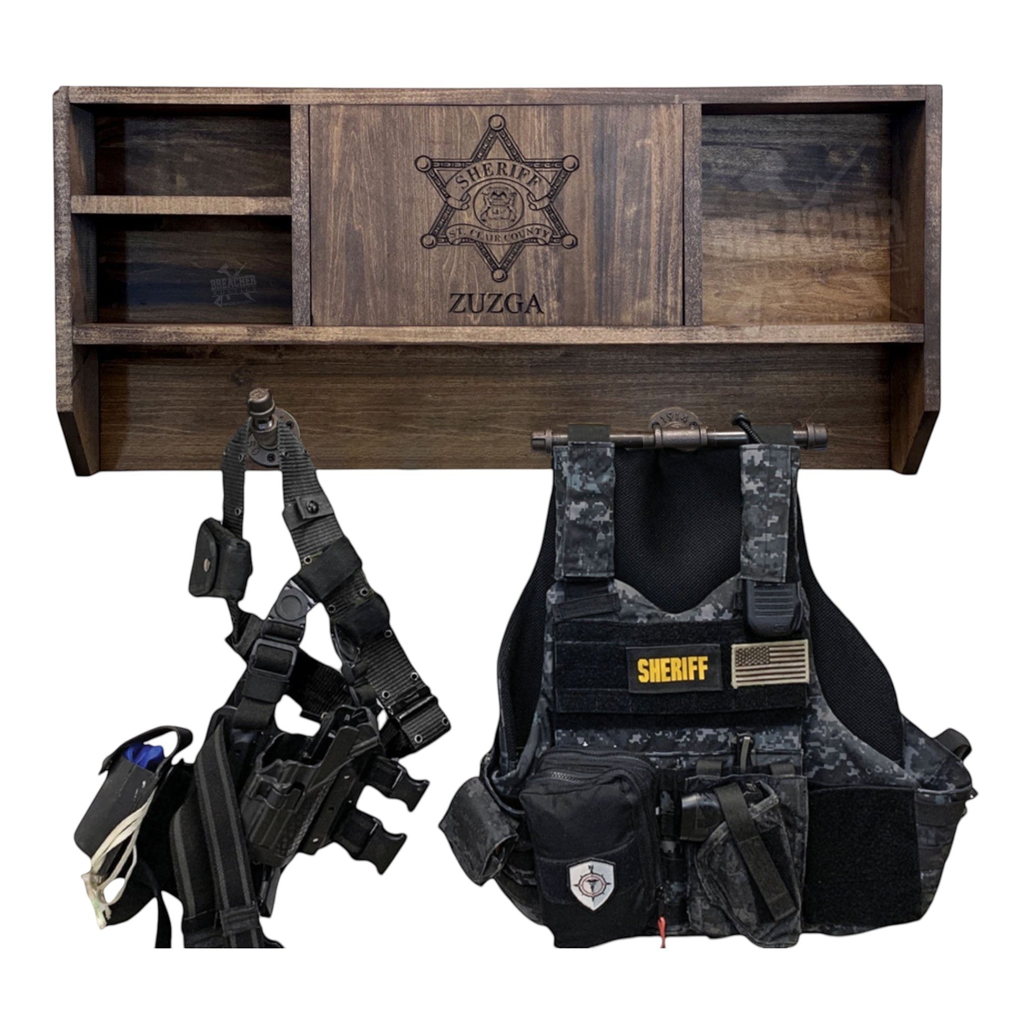 Breacher Rustics stained wood concealment shelf with Sheriff's department emblem and personalized name, displaying tactical gear including a vest and leg holster. leo concealment shelf gear rack RFID locking cabinet wooden wall mounted police gear organizer hidden storage usa made