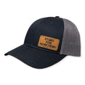 Breacher Rustics black cotton trucker hat with grey mesh back and bamboo leather patch featuring "Stand For Something" text.