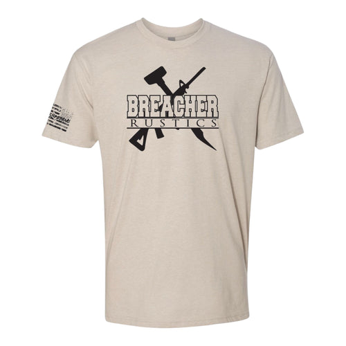 Breacher Rustics tan cotton t-shirt with black graphic logo of crossed hammer and rifle, and American flag detail on sleeve.