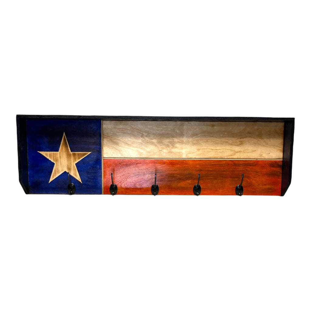 Breacher Rustics Texas flag wooden coat rack with 5 front hooks and 2 side hooks. Features blue, white, and red stripes with a large wooden star.