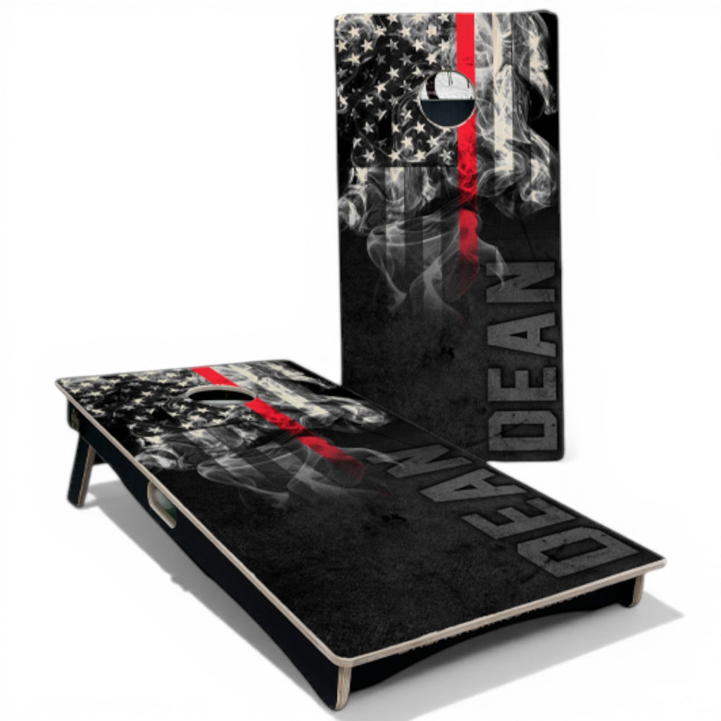 Breacher Rustics custom cornhole set featuring a distressed American flag with a thin red line and smoke graphic. Includes personalized name. thin red line cornhole set custom logo name handmade wooden firefighter patriotic backyard bean bag toss game boards