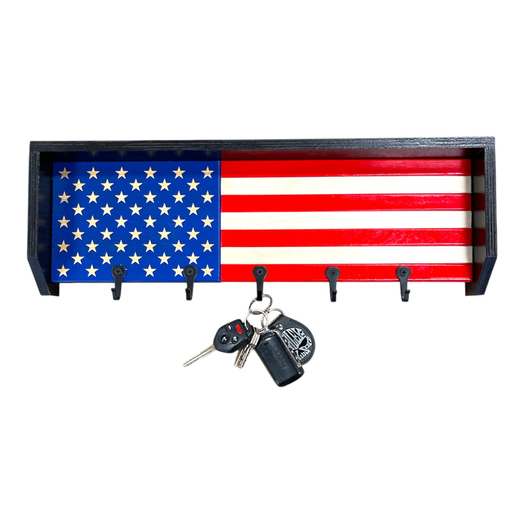 Breacher Rustics USA flag key rack with black hooks. Wood construction with red, white, and blue stripes and stars. handmade usa american flag wood key rack rustic wall organizer patriotic entryway decor key holder