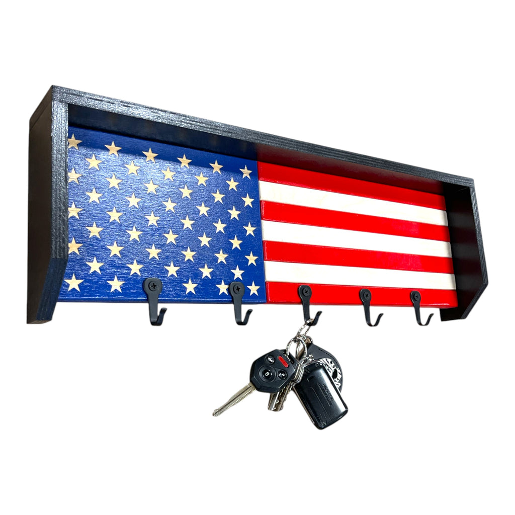 Breacher Rustics USA flag key rack with black hooks, red and white stripes, and blue field with stars. usa flag key rack wooden wall organizer patriotic entryway key holder rustic american flag decor