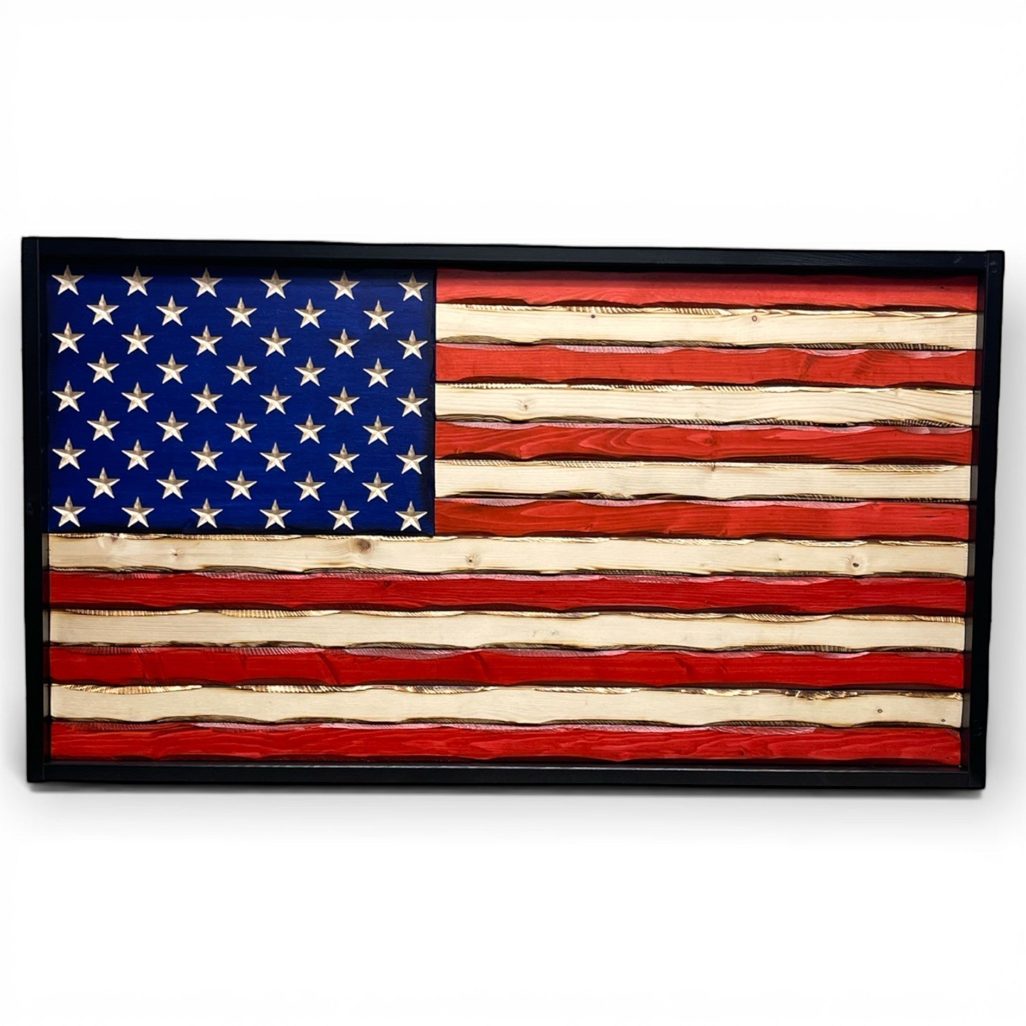 Breacher Rustics black framed wooden American flag with carved stars and a battle-worn patina finish. battle worn usa carved wood flag handmade american flag wall art patriotic rustic decor wooden flag usa made