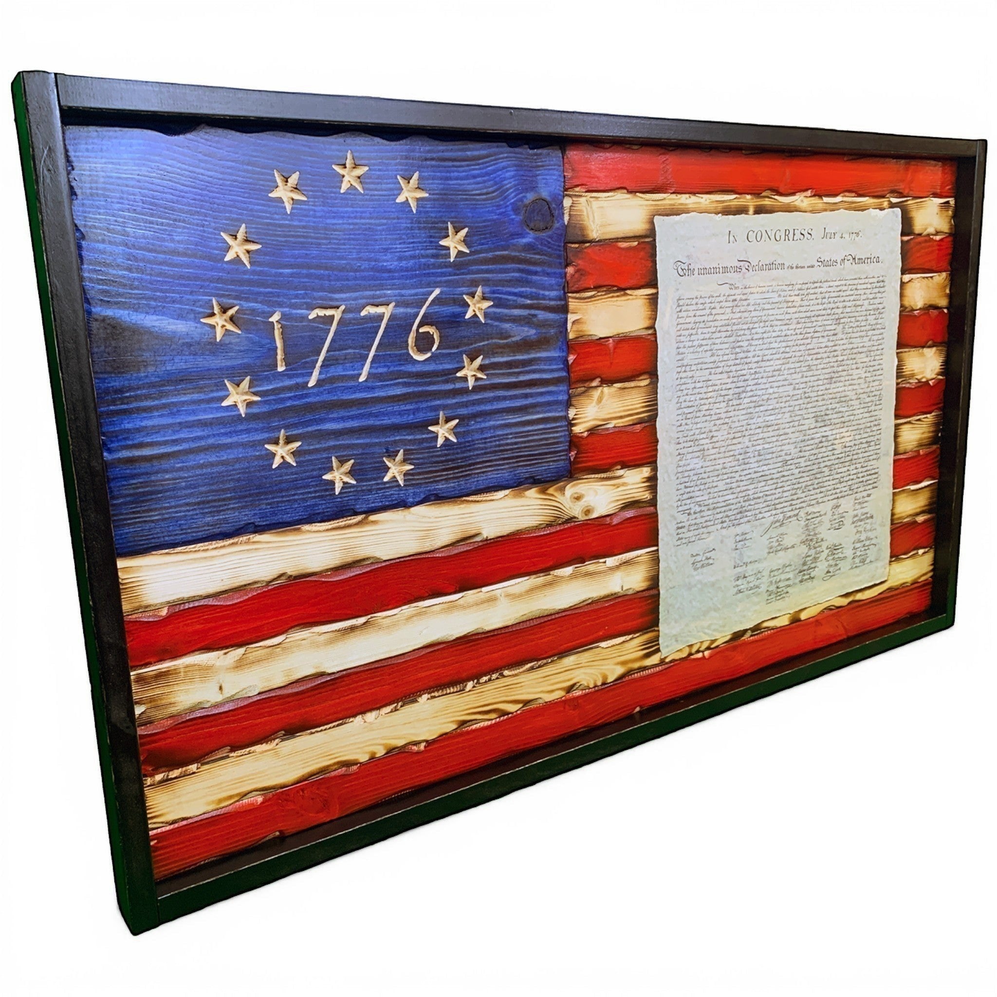 Breacher Rustics carved wood American flag with a battle-worn look, featuring the Declaration of Independence and "1776" carved into the union. founding fathers 1776 american flag carved wood patriotic wall decor declaration embedded rustic handmade flag