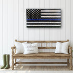 Breacher Rustics Thin Blue Line wooden American flag with black stripes and a blue stripe, displayed on a white paneled wall. thin blue line american flag wood wall decor carved patriotic wooden flag police support home decoration usa made
