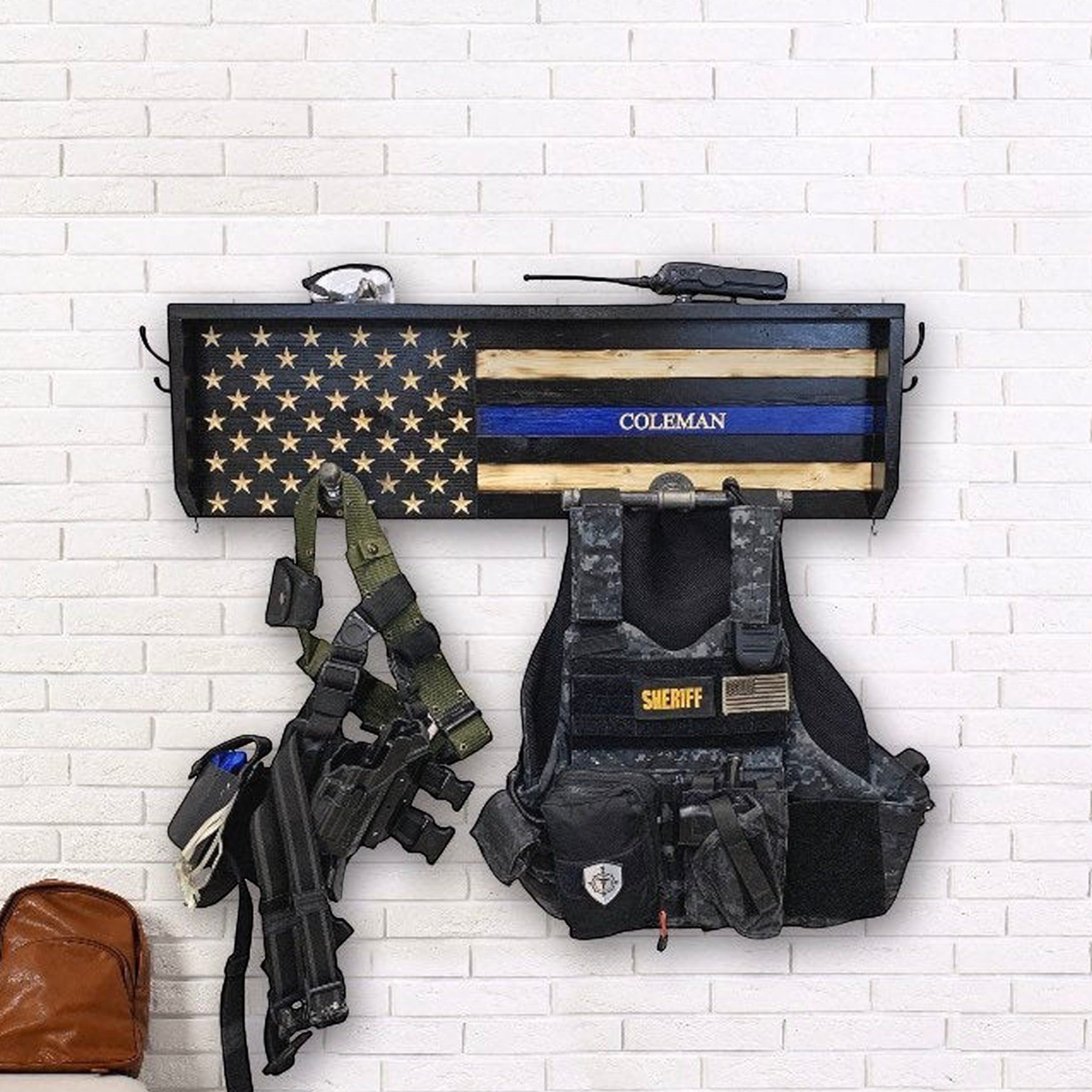Breacher Rustics Thin Silver Line American flag gear rack with custom name, holding tactical gear and a sheriff's vest. thin silver line corrections officer gear rack wooden wall mounted duty belt vest holder correctional officer tribute usa made